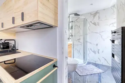 Cuisine ou kitchenette dans l'établissement Le Petit RZ Studio élégant aux portes de Nantes