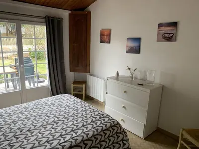 Un ou plusieurs lits dans un hébergement de l'établissement Maison de vacances , idéale pour famille avec accès plage et spa