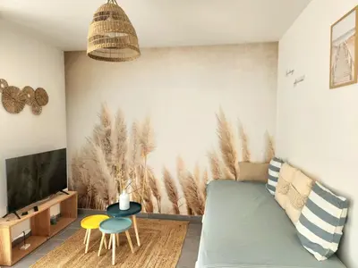 Télévision ou salle de divertissement dans l'établissement Maison à la décoration bord de mer bohème entre Pornic et Noirmoutier