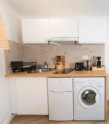 Cuisine ou kitchenette dans l'établissement Suite Guittet - Charme d'Anjou