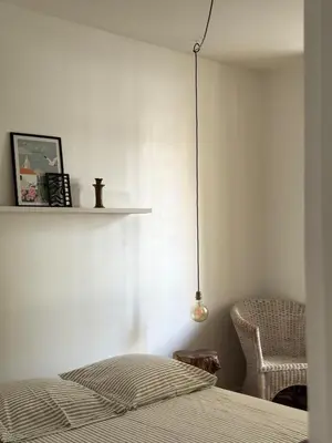 Un ou plusieurs lits dans un hébergement de l'établissement Appartement de charme - hyper centre avec parking privé