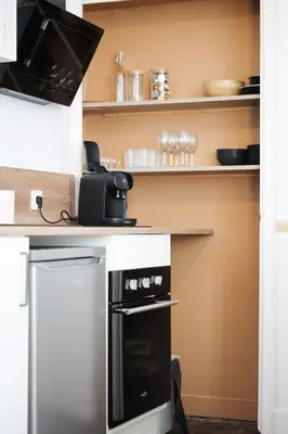 Cuisine ou kitchenette dans l'établissement bel appartement 2-4 personnes coeur de ville Angers