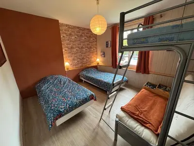 Un ou plusieurs lits dans un hébergement de l'établissement Gîte du Tilleul - un petit coin de nature