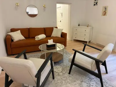 Coin salon dans l'établissement Appartement spacieux 8 pers - Coeur d'Angers - Balcon