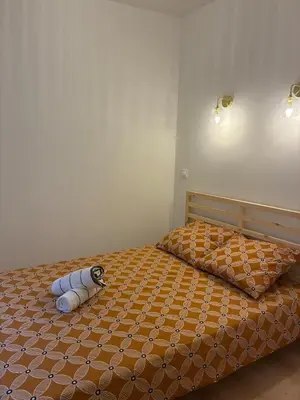 Un ou plusieurs lits dans un hébergement de l'établissement Appartement spacieux 8 pers - Coeur d'Angers - Balcon