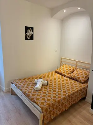 Un ou plusieurs lits dans un hébergement de l'établissement Appartement spacieux 8 pers - Coeur d'Angers - Balcon