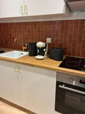 Cuisine ou kitchenette dans l'établissement Appartement spacieux 8 pers - Coeur d'Angers - Balcon
