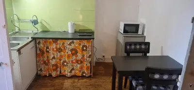 Cuisine ou kitchenette dans l'établissement Studio Nantes Sud