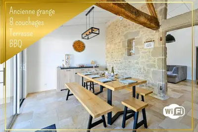 Restaurant ou autre lieu de restauration dans l'établissement La Tiboire Côté Grange - Authenticité & Elégance