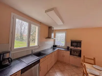 Cuisine ou kitchenette dans l'établissement Domaine Muleterie