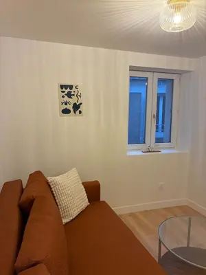 Coin salon dans l'établissement Appartement Chic 4 personnes - Plein Centre Historique