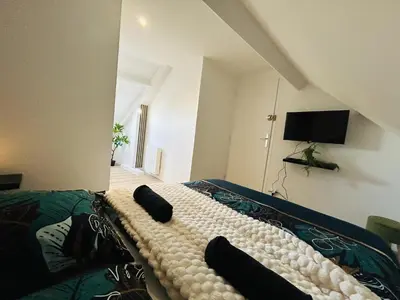 Télévision ou salle de divertissement dans l'établissement Casa Les Ponts de Cé