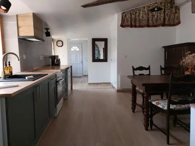Cuisine ou kitchenette dans l'établissement La Tanière du Renard