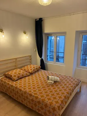 Un ou plusieurs lits dans un hébergement de l'établissement Appartement chic & cosy - 6 couchages Angers