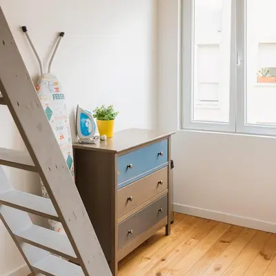 Un ou plusieurs lits dans un hébergement de l'établissement Joli studio lumineux Chez Madeleine
