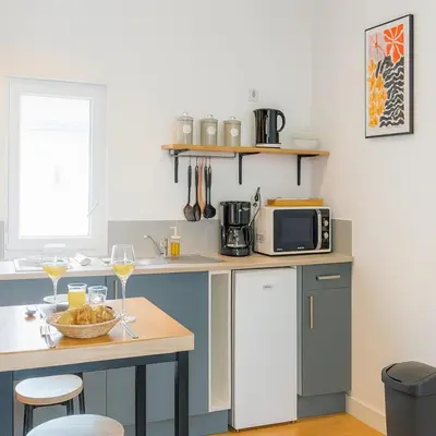 Cuisine ou kitchenette dans l'établissement Charmant T1 lumineux Chez Maurice