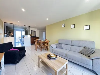 Coin salon dans l'établissement Le Bignon - Wifi, TV, 4 personnes, 1 min à pied du tram