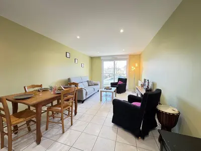 Coin salon dans l'établissement Le Bignon - Wifi, TV, 4 personnes, 1 min à pied du tram
