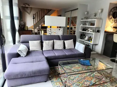 Coin salon dans l'établissement Résidence Com-60-st Andre Des Eaux - SAINT ANDRE DES EAUX - Maison avec piscine pour 6 personnes MAE-8133