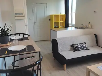 Coin salon dans l'établissement Appartement Cozy avec Parking privé, Wifi & Linge, Check-in autonome