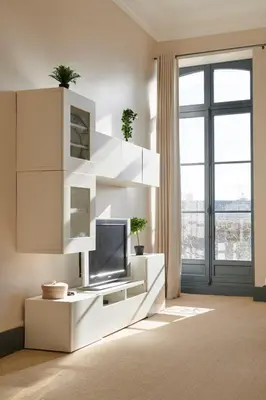 Télévision ou salle de divertissement dans l'établissement Le Feydeau