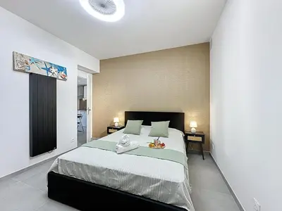 Un ou plusieurs lits dans un hébergement de l'établissement Holiday Home La Houle by Interhome