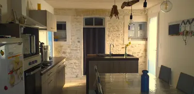Cuisine ou kitchenette dans l'établissement Maison 6 personnes
