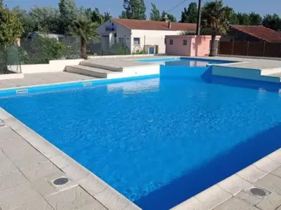 Piscine de l'établissement Mobil-home 4 pers. avec terrasse à Notre-Dame-de-Monts - API-1-52-946 ou située à proximité