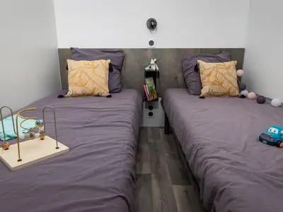 Un ou plusieurs lits dans un hébergement de l'établissement Mobil-home 31m² avec terrasse à Saint-Jean-de-Monts - API-1-52-1189