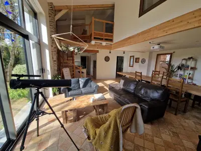 Coin salon dans l'établissement Domaine des 3 Arbres - Nature et tranquillité