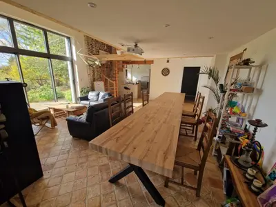 Coin salon dans l'établissement Domaine des 3 Arbres - Nature et tranquillité