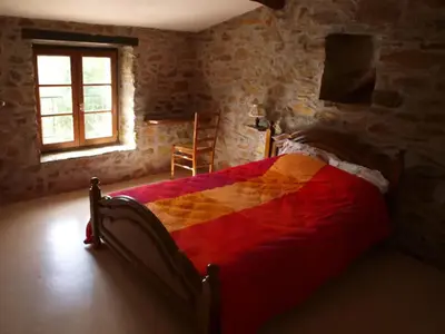Un ou plusieurs lits dans un hébergement de l'établissement Petit coin de paradis