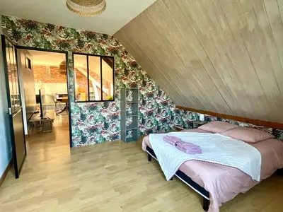 Un ou plusieurs lits dans un hébergement de l'établissement Appartement Tagada