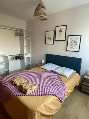 Un ou plusieurs lits dans un hébergement de l'établissement Appartement Tagada