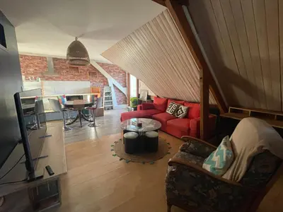 Coin salon dans l'établissement Appartement Tagada