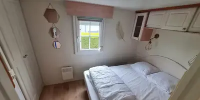 Un ou plusieurs lits dans un hébergement de l'établissement La casa du clos