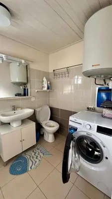 Salle de bains dans l'établissement Les Grelets