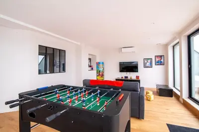 Salle de jeux dans l'établissement L'Atelier 23, Penthouse au coeur de Cholet