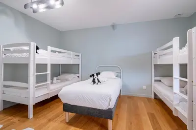 Un ou plusieurs lits dans un hébergement de l'établissement L'Atelier 23, Penthouse au coeur de Cholet
