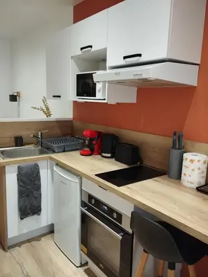 Cuisine ou kitchenette dans l'établissement Studio cœur de ville