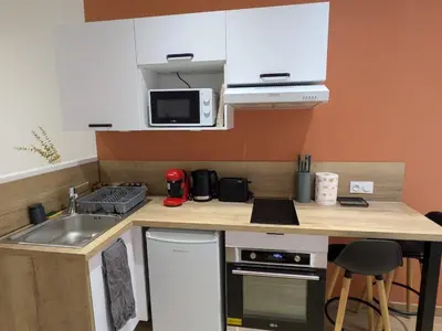 Cuisine ou kitchenette dans l'établissement Studio cœur de ville