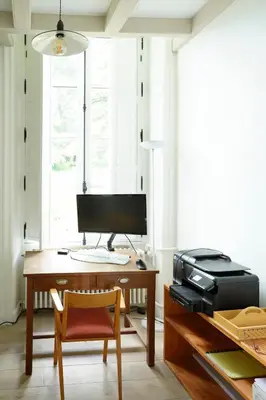 Télévision ou salle de divertissement dans l'établissement La Turmelière