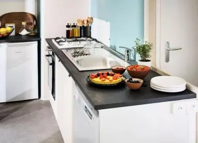 Cuisine ou kitchenette dans l'établissement ZEcamping 4 à 1km de la plage parc aquatique dog friendly club enfant