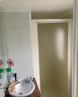 Salle de bains dans l'établissement L'Aurore