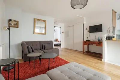 Télévision ou salle de divertissement dans l'établissement Appartement Calme en Centre-ville avec Parking