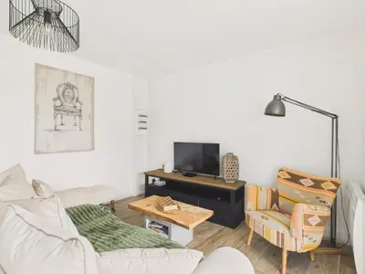 Télévision ou salle de divertissement dans l'établissement Confort pour 6 à 800 m de la plage