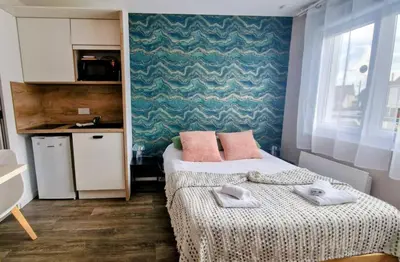 Cuisine ou kitchenette dans l'établissement Nouveau - La Cabine du Capitaine