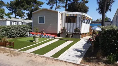 Jardin de l'établissement Mobile Home 127 Bois Dormant