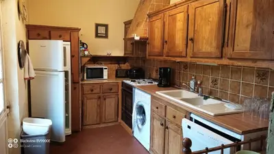 Cuisine ou kitchenette dans l'établissement Domaine du Puy Bobet - Vue Unique & Charme 10 pers