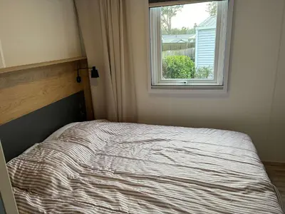 Un ou plusieurs lits dans un hébergement de l'établissement Le parc des roselieres 54 Saint Hilaire de Riez